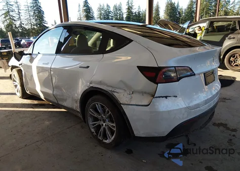 2023 Tesla Model Y Awd/Long Range Dual Motor All-Wheel Drive z USA, uszkodzony, nr VIN 7SAYGDEE3PF863139